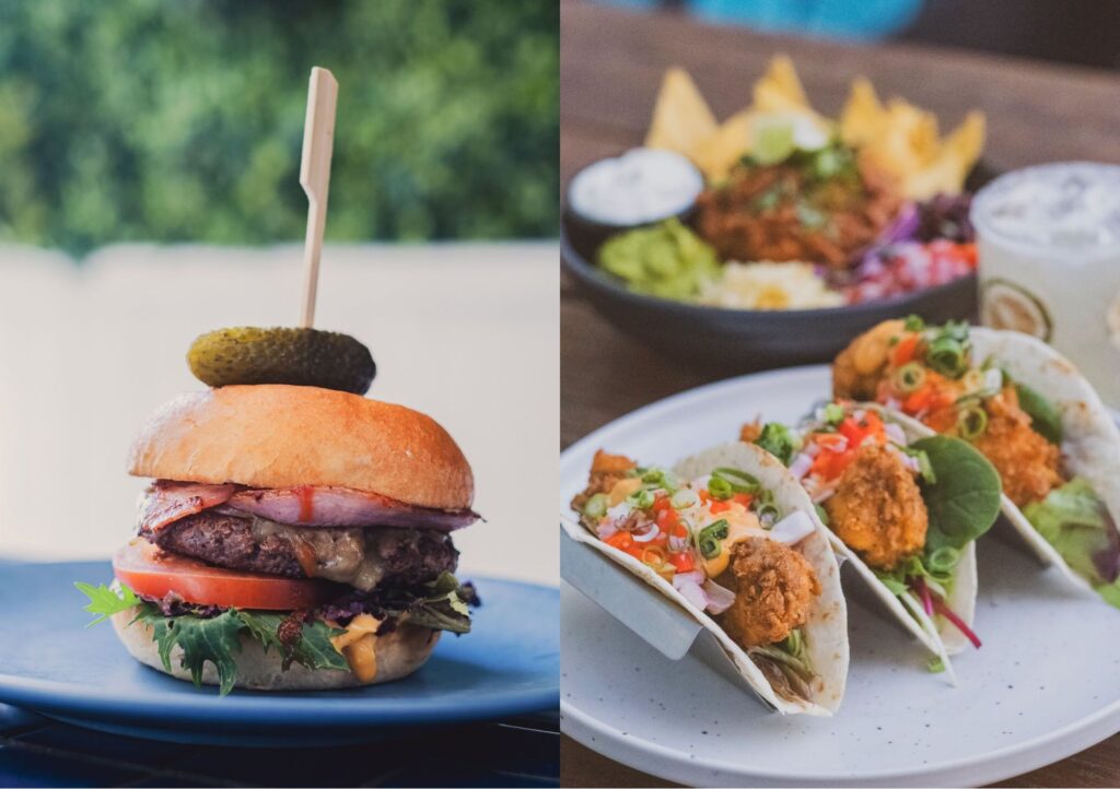Bistro meals at Settlers Inn Port Macquarie featuring a burger and tacos served with classic pub-style sides.